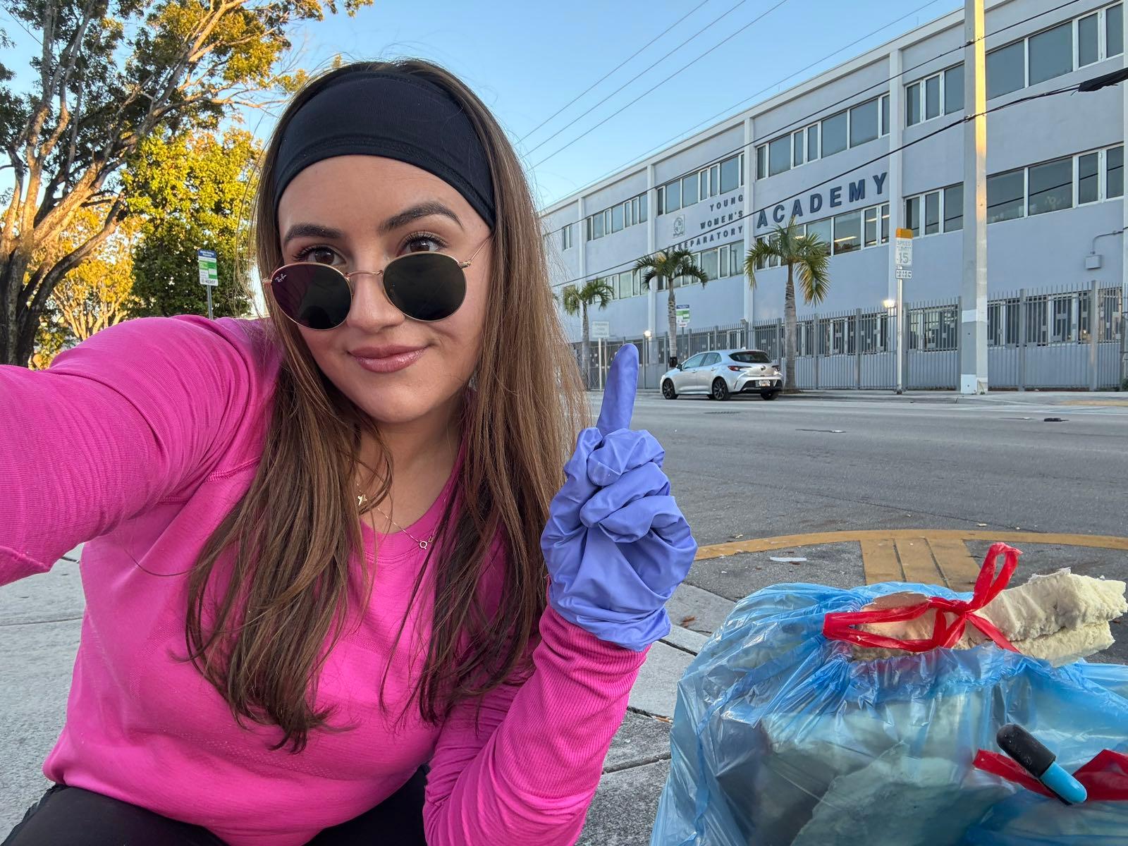 Patricia picking up litter in her neighborhood